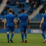 Sfeerbeeld van KRC Genk-spelers die samen vieren in het stadion