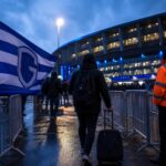 Transfergerichte sfeer rond KRC Genk met stadioncontext en focus op zomerse mercato