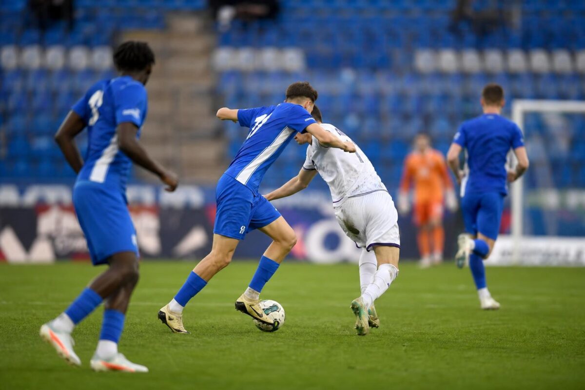 Spelers van KRC Genk in actie tijdens een play-offwedstrijd