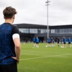 Sfeerbeeld van een training bij Club NXT, met spelers zonder herkenbare gezichten
