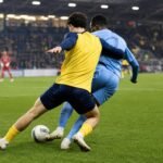 Sfeerbeeld rond Union SG met Christian Burgess in actie, zonder herkenbare gezichten