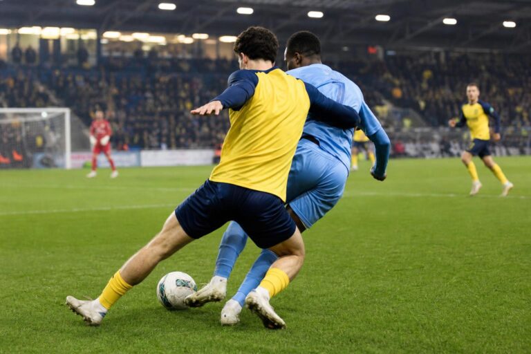 Sfeerbeeld rond Union SG met Christian Burgess in actie, zonder herkenbare gezichten