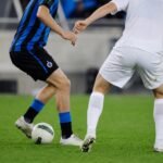 Wedstrijdbeeld van Club Brugge met Nicolo Tresoldi in actie, zonder herkenbare gezichten.
