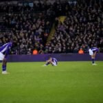 Spelers van RSC Anderlecht op het veld in een bedrukt moment