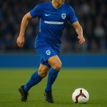 Daan Heymans van KRC Genk in actie tijdens een wedstrijd in de Cegeka Arena