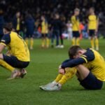 Union-spelers reageren ontgoocheld na een cruciaal duel in de titelstrijd