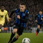 Christos Tzolis in actie voor Club Brugge tijdens een intense titelsfeer.