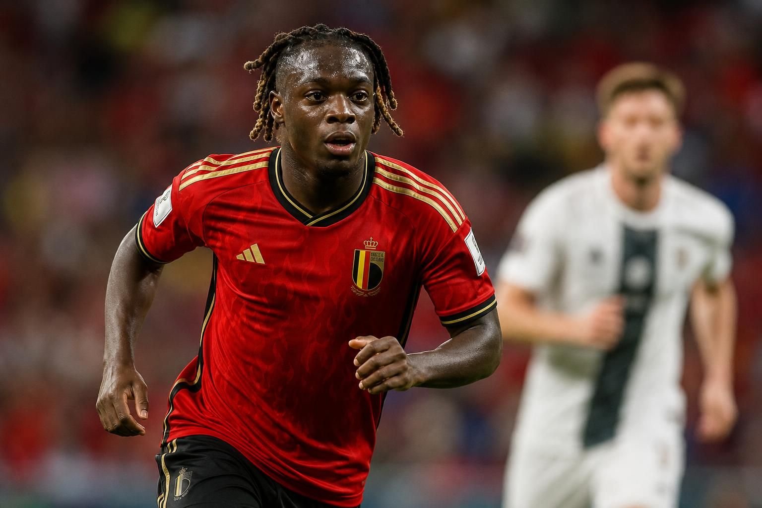 Jérémy Doku in actie voor de Rode Duivels tijdens een intense WK-sfeer
