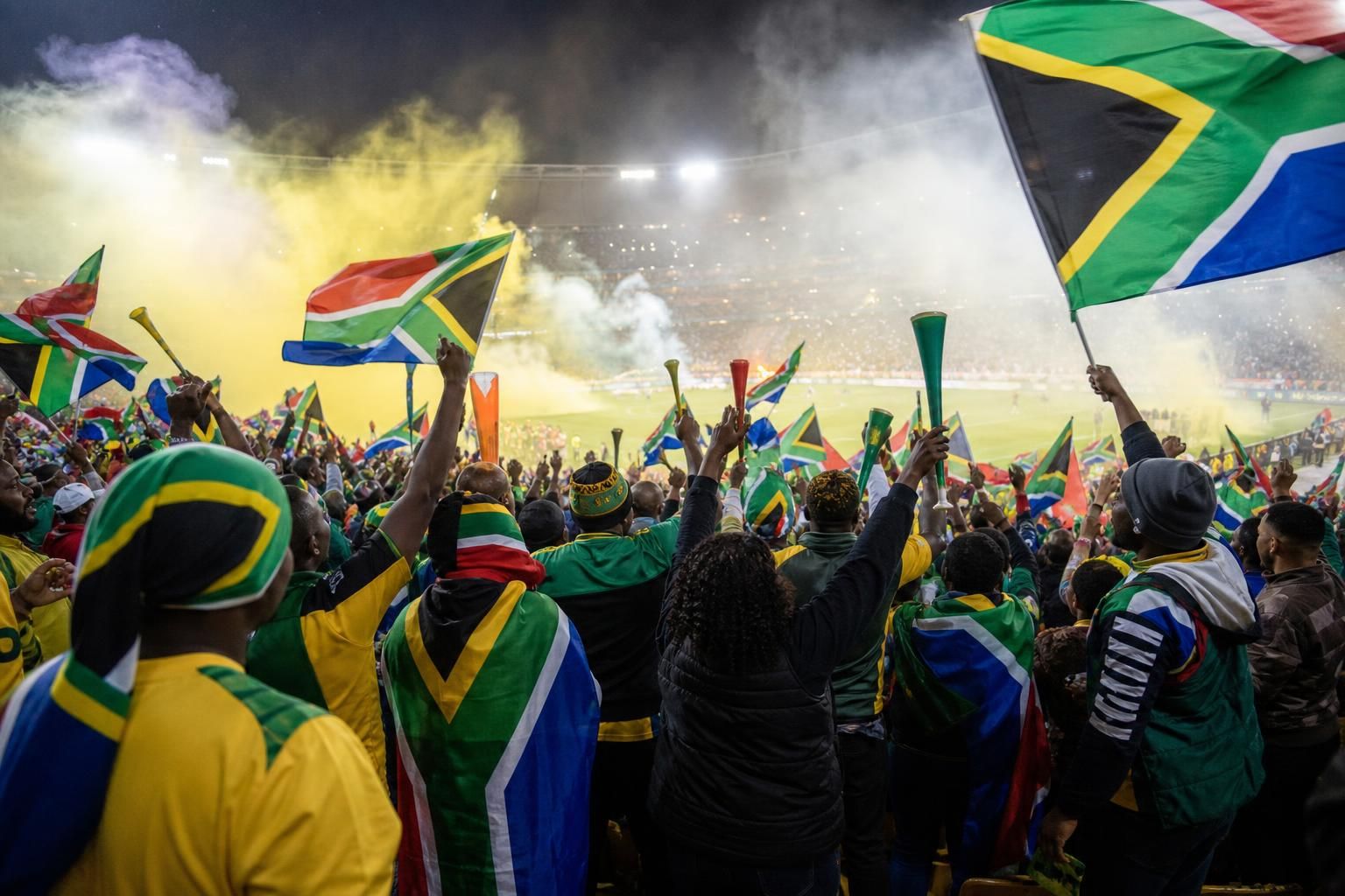 Zuid-Afrikaanse supporters vieren de historische WK-kwalificatie onder Hugo Broos
