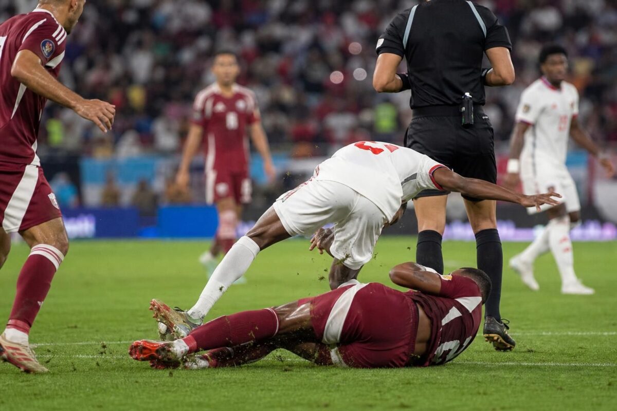 Tense WK match atmosphere after a heavy tackle during Canada against Qatar