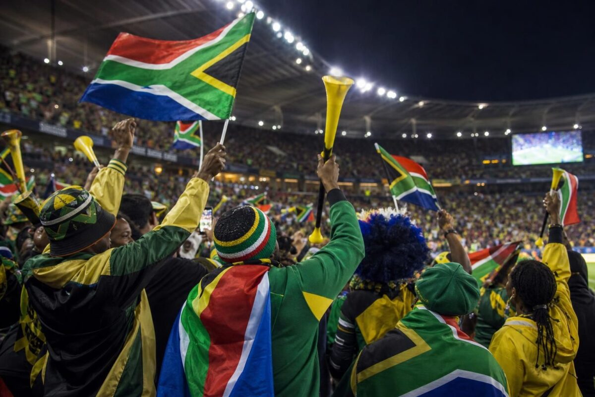 Zuid-Afrikaanse supporters vieren de WK-kwalificatie in een stadion
