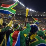 Zuid-Afrikaanse supporters vieren de WK-kwalificatie in een stadion