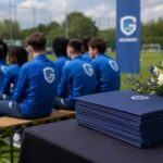 Academy-sfeer bij KRC Genk rond opleiding en diploma’s.