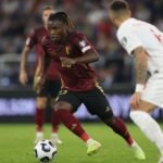 Jérémy Doku in actie voor de Rode Duivels tijdens een intense interlandcontext