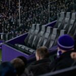 Gespannen stadionbeeld rond RSC Anderlecht als symbool voor vragen over gezag en identiteit