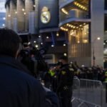 Transfercontext rond Real Madrid met pers en stadionlicht, zonder herkenbare gezichten