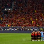 De Rode Duivels vieren tijdens een interland in een vol stadion