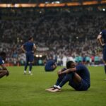 Franse spelers reageren ontgoocheld na de WK-troostfinale tegen Engeland