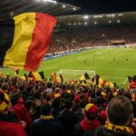 Supporters van de Rode Duivels in een stadion na een WK-wedstrijd