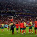 Marokkaanse spelers vieren de WK-kwalificatie voor de kwartfinales na de zege tegen Canada
