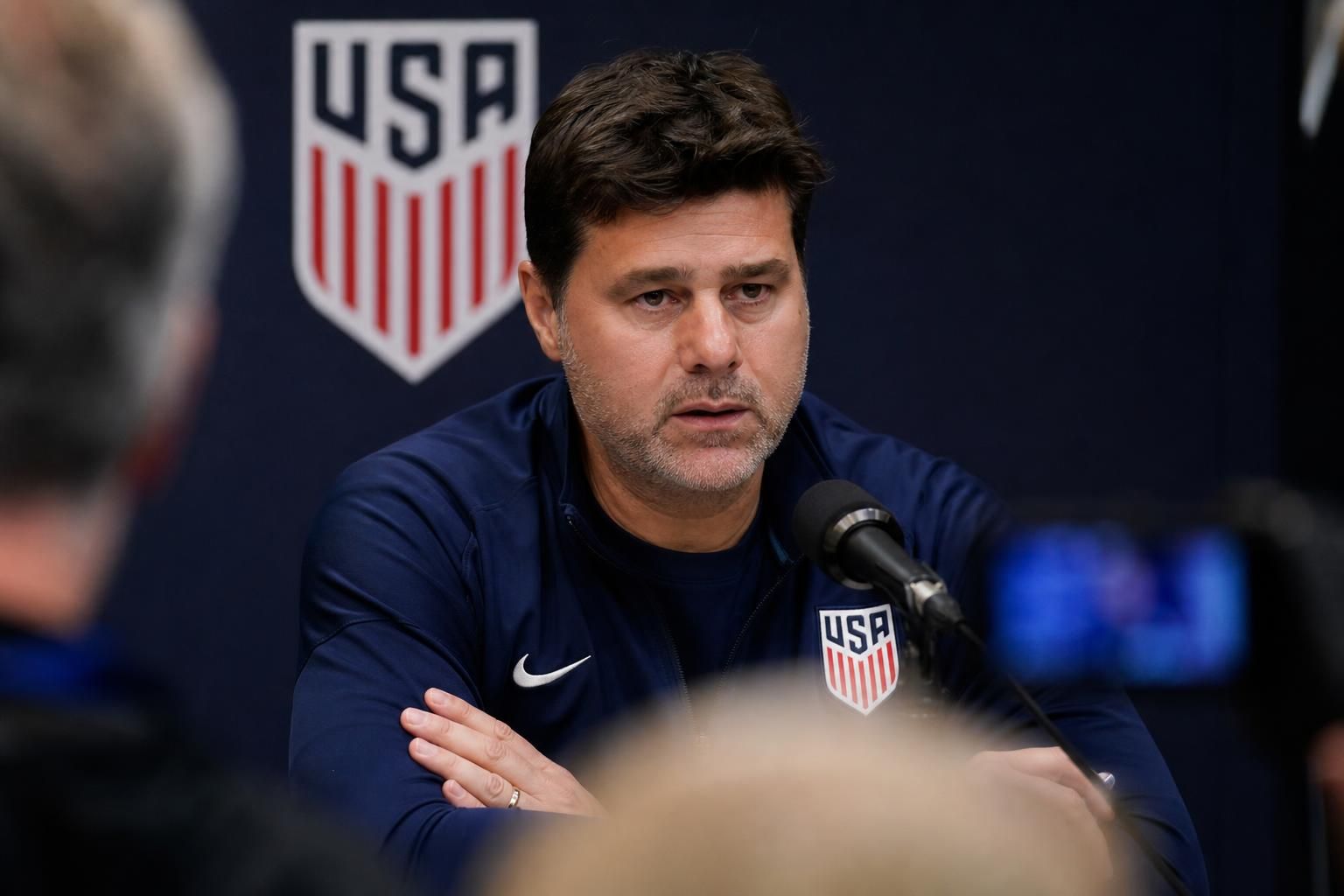 Mauricio Pochettino tijdens een gespannen persmoment voor het duel tegen de Rode Duivels