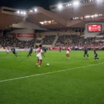 Spelers van AS Monaco tijdens een wedstrijd in hun thuisstadion