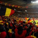 Belgische supporters vieren in een WK-stadion tijdens de run van de Rode Duivels.