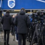 Transferdruk rond KRC Genk in een stadioncontext zonder herkenbare gezichten