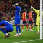 Franse spelers reageren ontgoocheld na een penaltymoment tegen Spanje op het WK