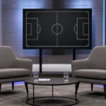 Een neutrale televisiestudio ingericht voor een voetbalgesprek.
