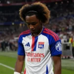 Malick Fofana van Olympique Lyon op het veld na een wedstrijd.