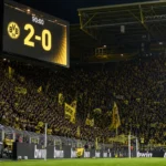 Verlicht scorebord in het stadion van Borussia Dortmund na een Bundesliga-thuiszege.