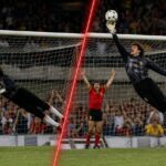 Preud'homme wordt links geklopt en stopt rechts Platts volley in Bologna