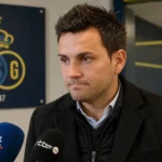 Philippe Bormans spreekt na een Europese wedstrijd in een mediazone van Union.
