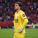 Jari De Busser van AZ staat na de wedstrijd bij zijn doel in het Stadium of Light.