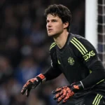 Senne Lammens in doel voor Manchester United tijdens een wedstrijdmoment.