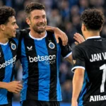 Spelers van Club Brugge vieren samen tijdens een wedstrijd.