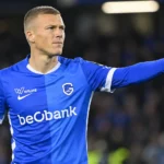 Daan Heymans van KRC Genk reageert op het veld tijdens een wedstrijdmoment.