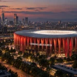 Avondzicht op de rode gevel van het geplande Generali Stadium in Milaan.