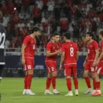 Indonesische spelers in rode tenues tijdens de finale tegen Thailand.