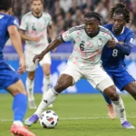 Voetballers van België en Frankrijk in duel tijdens een internationale wedstrijd.