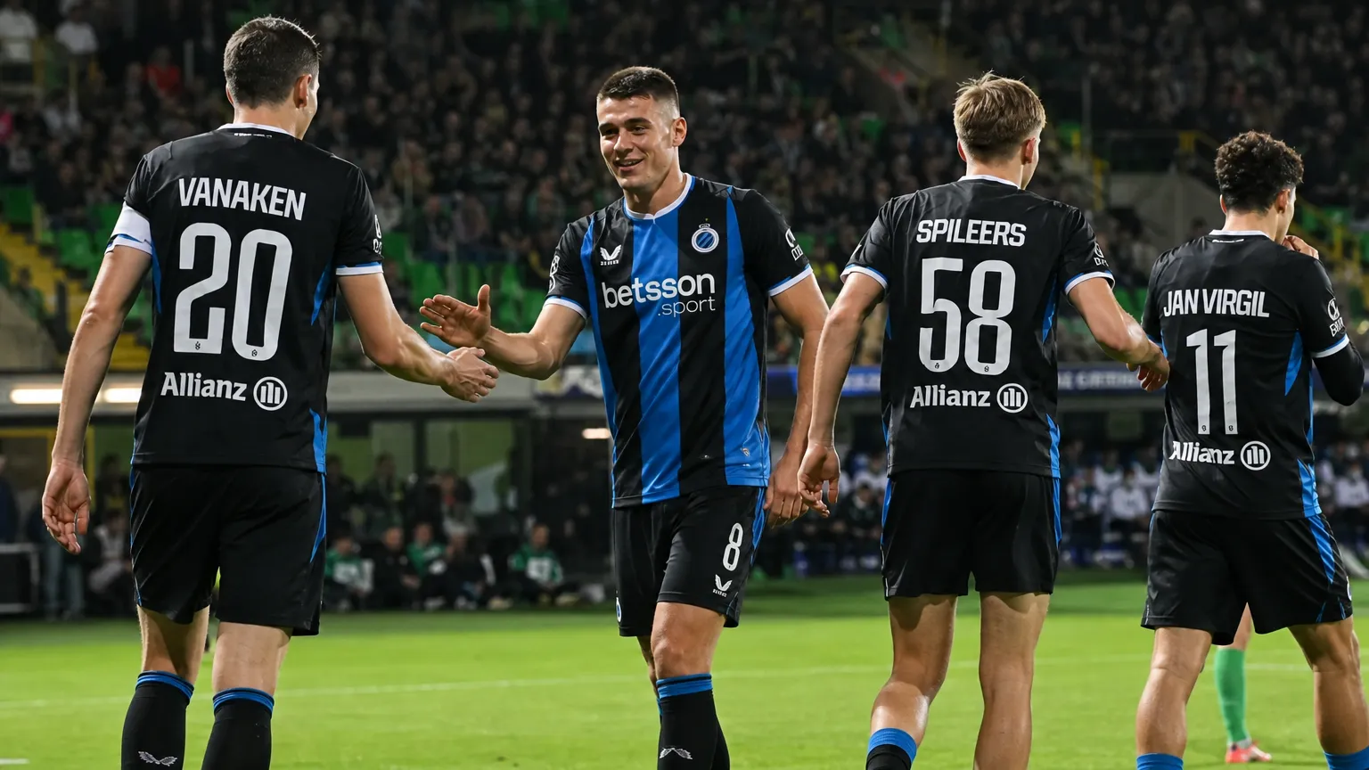 Spelers van Club Brugge vieren samen tijdens een wedstrijdmoment.