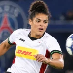 Een speelster van OH Leuven Women in actie tijdens een Europese wedstrijd.