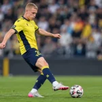 Louis Patris van Union in actie op een voetbalveld.