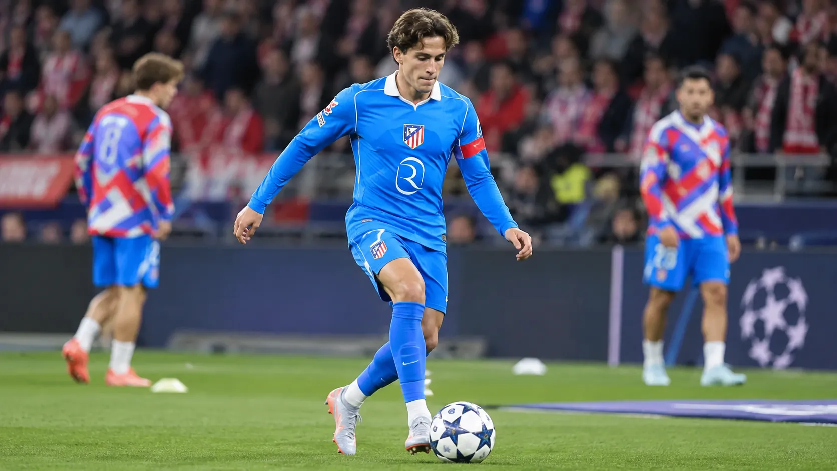 Giuliano Simeone warmt op in zijn Atlético Madrid-tenue.